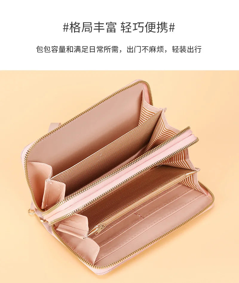 محفظة طويلة من الجلد الصناعي للنساء - حقيبة يد مزينة بشرابة