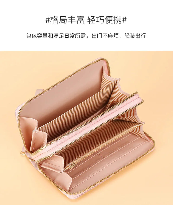 محفظة طويلة من الجلد الصناعي للنساء - حقيبة يد مزينة بشرابة